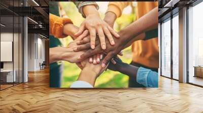 Community of people stacking hands together, Peoples putting their hands on top of each other social, community and team building concept  Wall mural