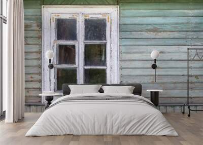 The old window of old wooden house. Background of wooden walls. Wall mural