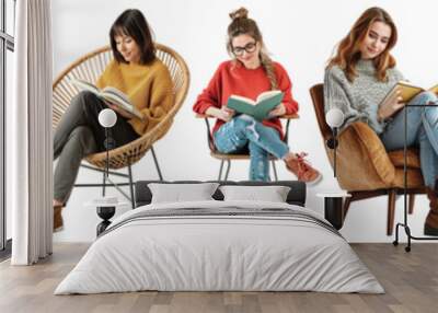 Pack of Happy woman reading book while sitting on chair set against transparent background Wall mural