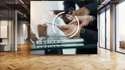 business man on network and  using laptop and digital tablet with marketing virtual icon . Wall mural