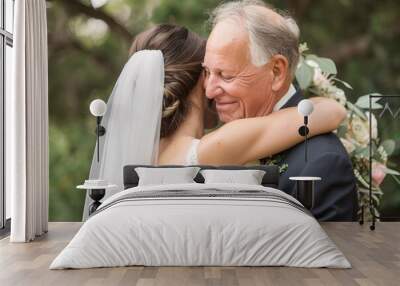 A heartfelt embrace between the bride and her father, captured in a close-up shot that conveys their bond and love 02 Wall mural