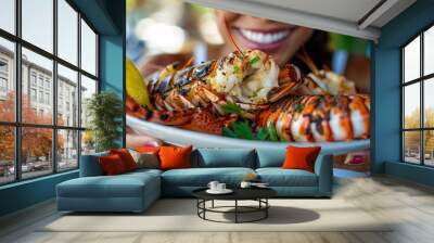 Close-up of a woman savoring a mouthwatering plate of grilled lobster tails Wall mural