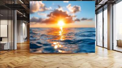 The sun s golden rays cast a mesmerizing reflection on the still mirror like surface of the ocean creating a breathtaking ethereal scene at dusk Wall mural