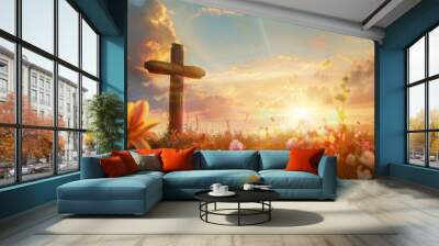 Sun rising behind a wooden cross adorned with fresh spring flowers. Easter morning. Wall mural