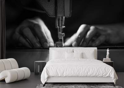 a man at work on a sewing machine. without a face. Wall mural