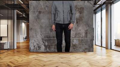 Full length studio portrait of attractive young man. Young Male Fashion Model Posing In Casual Outfit.  Wall mural