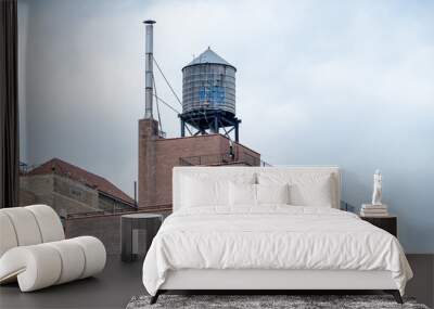 typical water tank on the roof of a building in New York City Wall mural