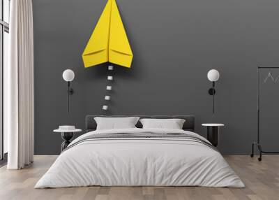 yellow paper plane on a gray background Wall mural