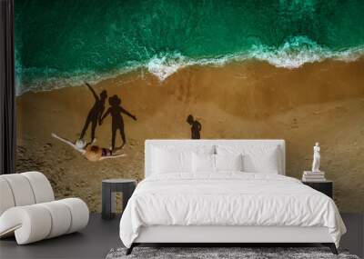 Aerial view of beach with family. Free space for your decoration and summer time.  Wall mural