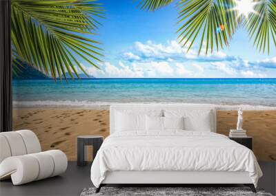 Beautiful beach by the clear sea on a beautiful sunny holiday day Wall mural