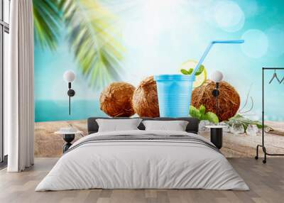 Desk of free space and summer beach . Drink with coconuts and palms.  Wall mural