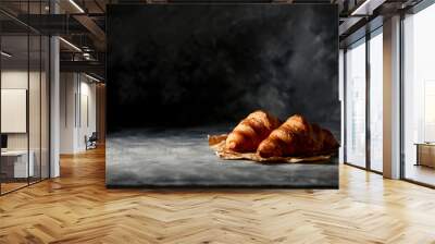 Fresh croissant on dark mood background and copy space for your product.  Wall mural