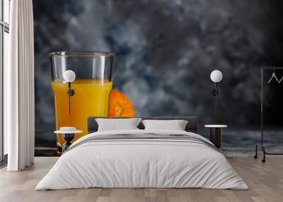 Fresh orange juice and copy space for your product.  Wall mural