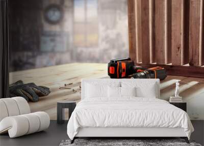 Screwdriver on table and interior of workshop. Empty space for your decoration.  Wall mural