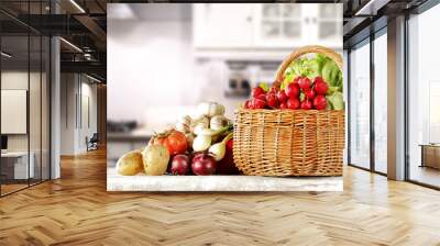 vegetables on wooden table in kitchen space  Wall mural