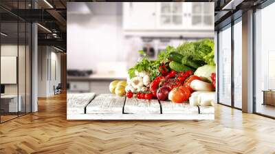 vegetables on wooden table in kitchen space  Wall mural