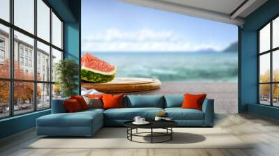 Watermelon on desk and summer beach  Wall mural