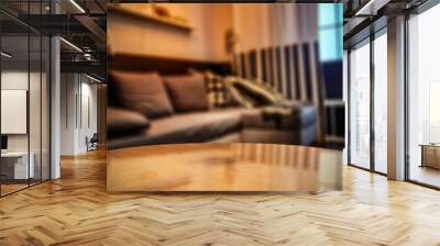 Wooden coffee table of free space for your decoration and blurred background of home interior.  Wall mural