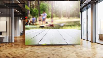 Wooden table backgruond with nature in distance. Blurred garden view.  Forest view in background. Wall mural