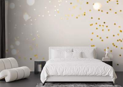 Festive gold background. Shining stars confetti and fairy lights on beige and Set Sail Champagne background. Christmas. Wedding. Birthday. Flat lay, top view, copy space Wall mural