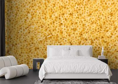 Macaroni stars background. Italian pasta for soup. Wall mural