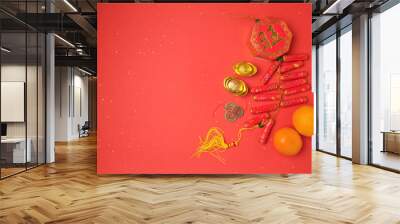 Chinese New Year decorations on red background. View from above with copy space Wall mural