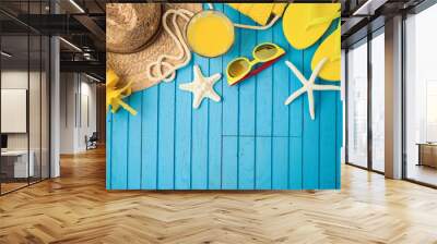 Summer holiday vacation background with beach accessories on wooden table. Wall mural