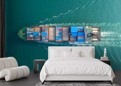 Container ship in export and import business and logistics. Shipping cargo to harbor by crane. Water transport International. Aerial view Wall mural