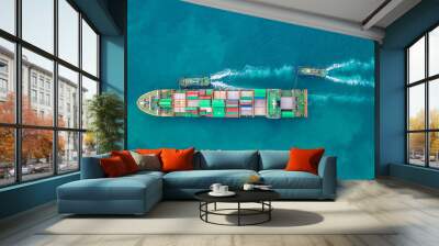 Container ship in export and import business logistics and transportation. Cargo and container box shipping to harbor by crane. Water transport International. Aerial view and top view. Wall mural