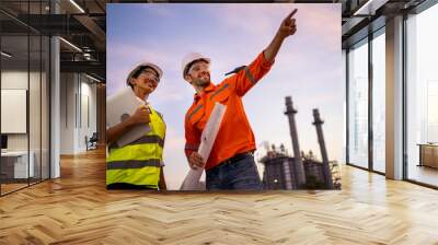 Engineer inspecting in industrial oil refinery. Industry 4.0 concept. Background blurred concept. Wall mural