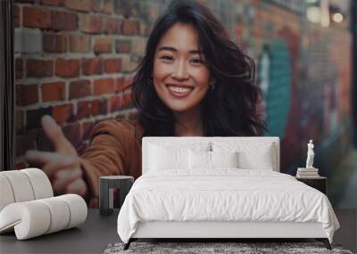 East Asian Pretty woman smiling stretching for a hand background wallpaper png file Wall mural