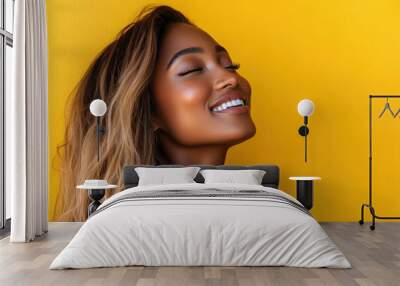 A close up of a black woman's face with her eyes closed and long blond hair Wall mural