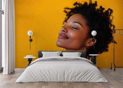 A close up of a tattooed black woman's face with her eyes closed Wall mural