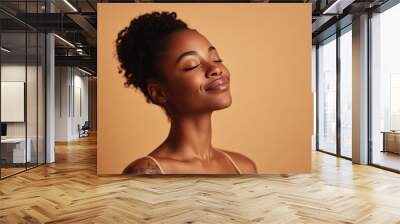 A close up of a tattooed black woman's face with her eyes closed Wall mural