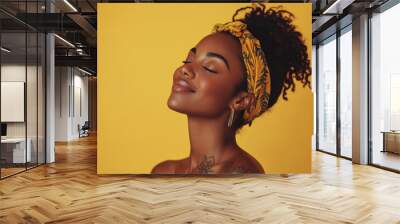 A close up of a tattooed black woman's face with her eyes closed Wall mural