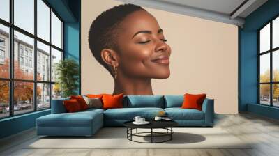 A close up of a tattooed black woman's face with her eyes closed Wall mural