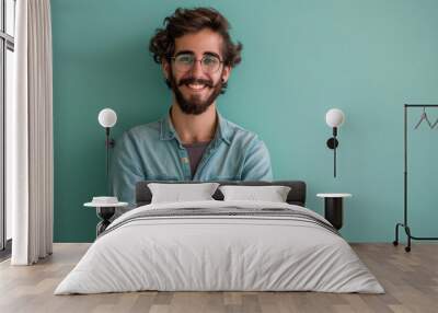 A close up portrait of a young man with a subtle smile Wall mural