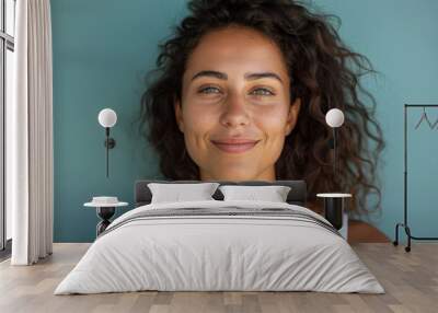 A close up portrait of a young woman with a subtle smile Wall mural