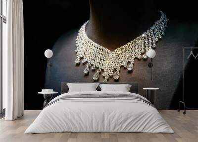 Necklace made of white gold with diamonds on a stand. Wall mural