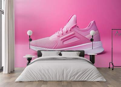 Pink sneaker isolated on pastel pink background, woman sport shoe fashion, sneakers, trainers, sport lifestyle, running concept, product photo, street wear. Simple minimalist fashion footwear Wall mural