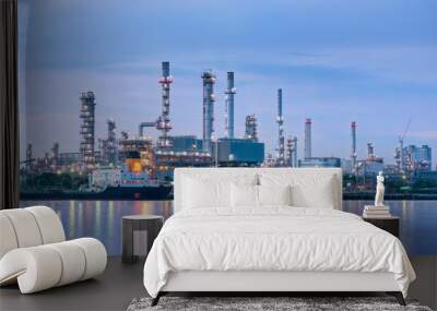 Oil and Gas plant with shipping loading dock at twilight Wall mural