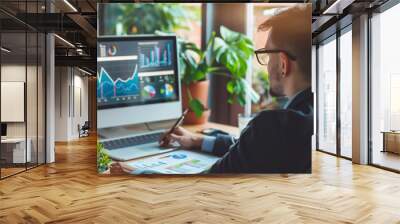 Cropped photo of a businessman analyzing business diagrams, marketing statistics Wall mural