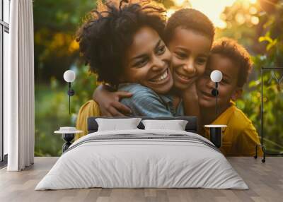 Cropped shot of a young family spending time together outdoors, with her boys filling her life with joy Wall mural