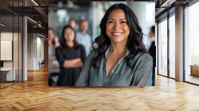 Happy smiling confident female Hispanic businesswoman team leader standing together with diverse multiethnic business group in office. Company professional multinational staff portrait Wall mural