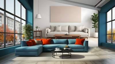 A minimalist living room with a beige sofa, wooden coffee table, and a blank white mockup on the wall Wall mural