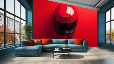 A high-resolution photo of a vintage motorcycle helmet on a solid red background. isolated on a solid red background design Wall mural