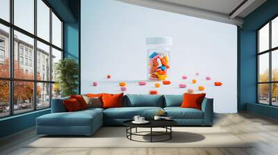 Assorted Pills Spilled from an Amber Bottle on a White Background Design. 3D Rendering design Wall mural