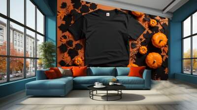 Black man and womens t-shirt halloween mockup with pumpkins and leaves on orange background. Design t shirt template, print presentation mock up. Top view flat lay Wall mural