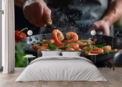 Chef cooking seafood stir fry in a pan in the kitchen Wall mural