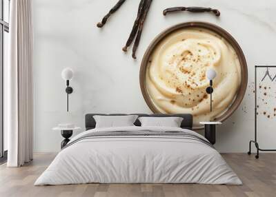 Creamy vanilla pudding in a bowl on white marble background. Wall mural